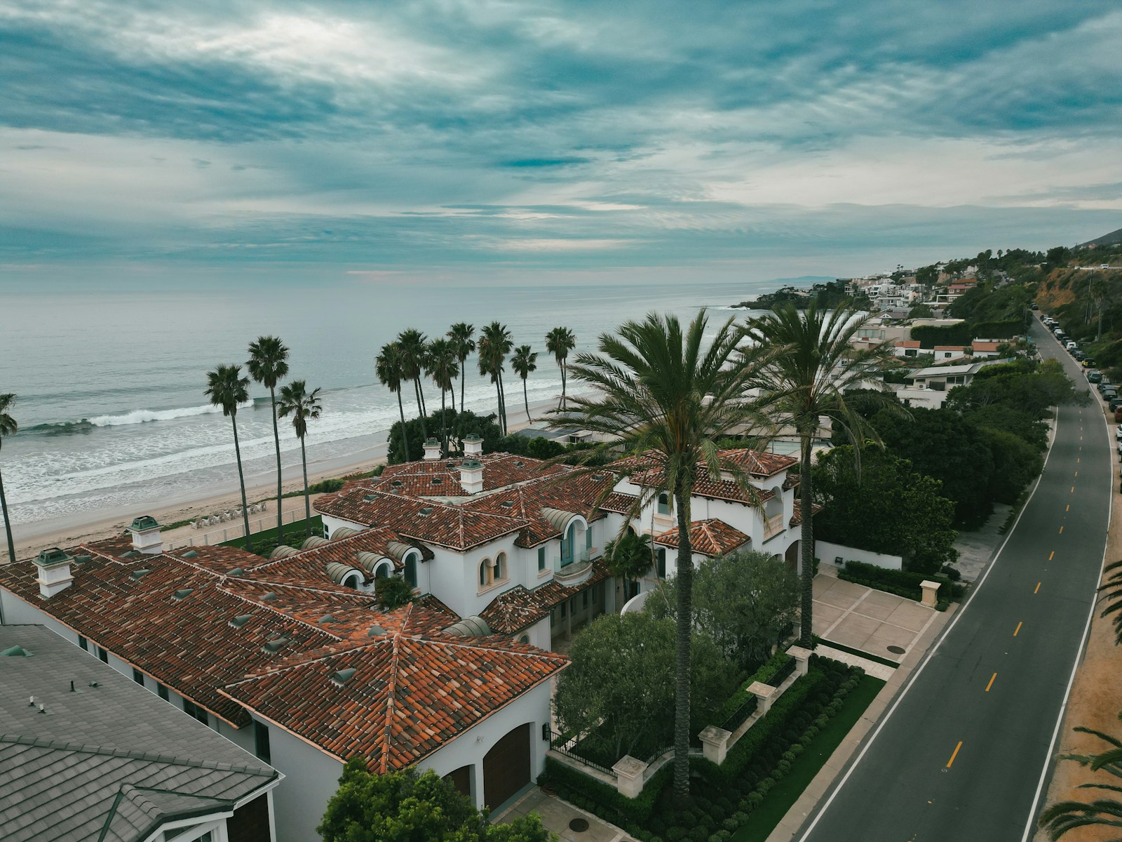 an aerial view of a beach front home, San Diego real estate videography